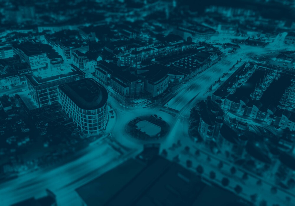 Aerial view of Saint Helier Offshore Finance Centre, Jersey, representing the commercial and private client bespoke insurance solutions by Hepburns.